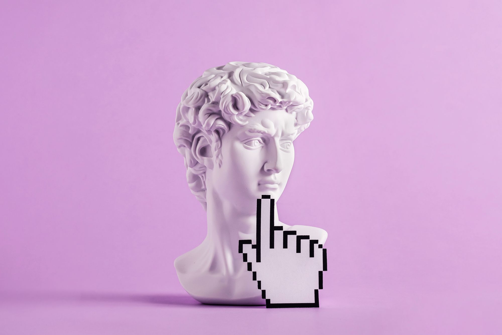 Head of Michelangelo’s statue of David overlaid with a mouse cursor with finger pointing to David’s chin.  