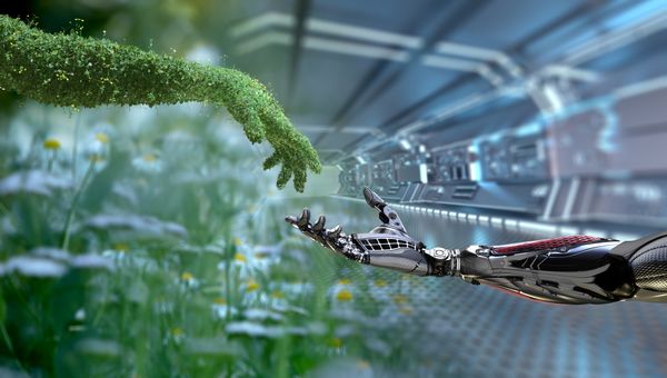 Green technology concept of human arm covered with grass reaching for robotic arm. 